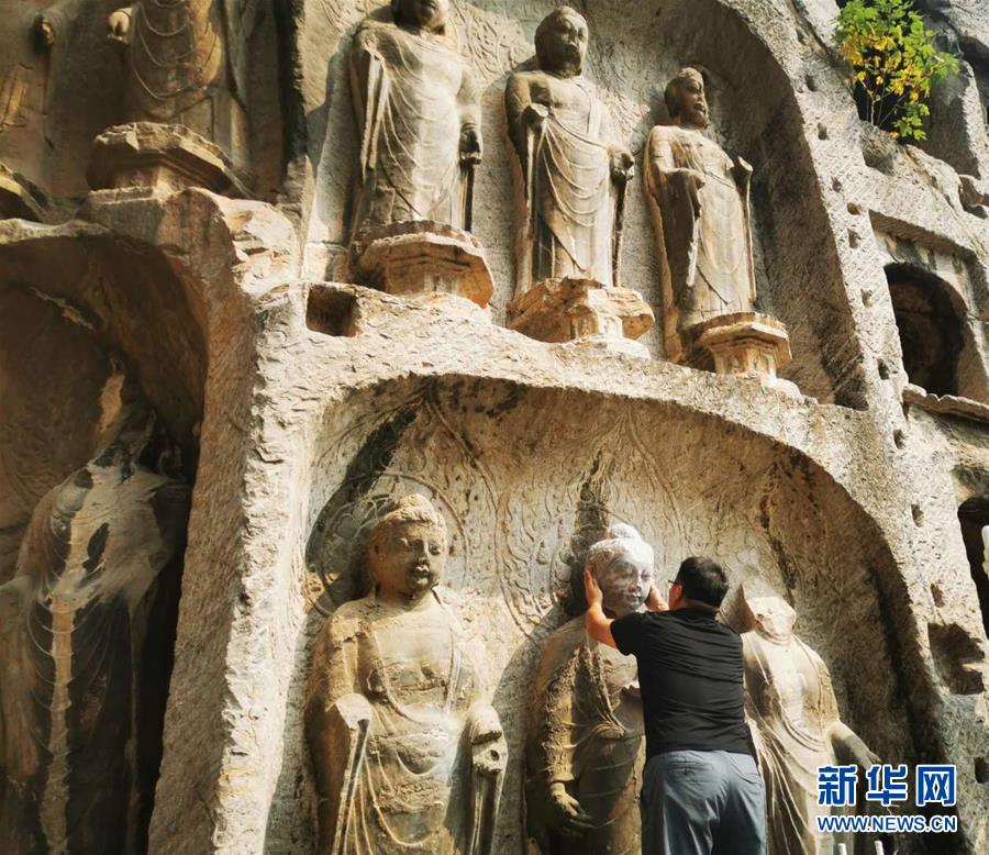 （圖文互動(dòng)）（4）合體了，龍門石窟流散佛首首次實(shí)現(xiàn)“數(shù)字復(fù)位”