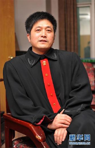 （圖文互動(dòng)）其人如蘭，既潔且馨——追記“全國(guó)模范法官”胡國(guó)運(yùn)
