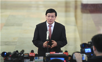 全國社?；鹄硎聲硎麻L樓繼偉接受采訪
