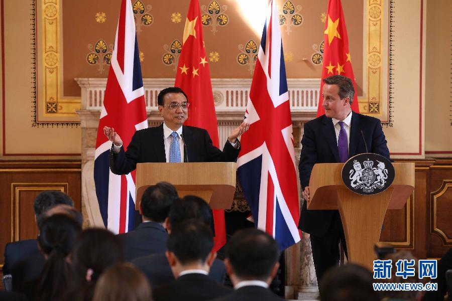 6月17日，國務(wù)院總理李克強(qiáng)同英國首相卡梅倫在倫敦舉行中英總理年度會晤后共同會見記者。新華社記者 龐興雷 攝