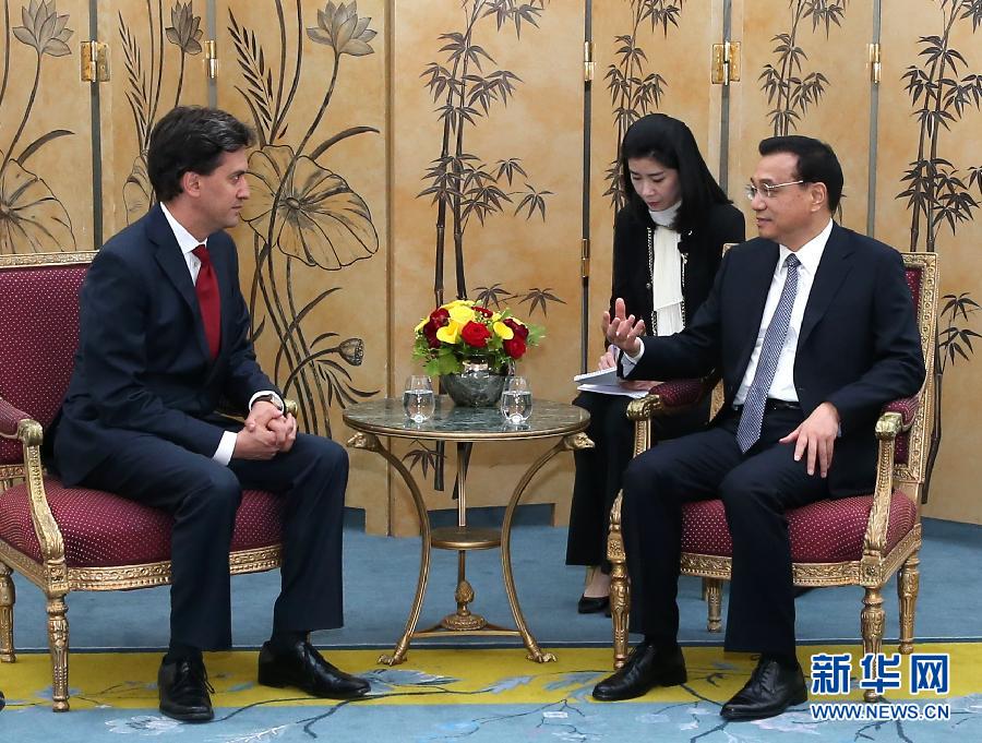 6月18日，國(guó)務(wù)院總理李克強(qiáng)在倫敦會(huì)見(jiàn)英國(guó)工黨領(lǐng)袖埃德·米利班德。新華社記者 龐興雷 攝