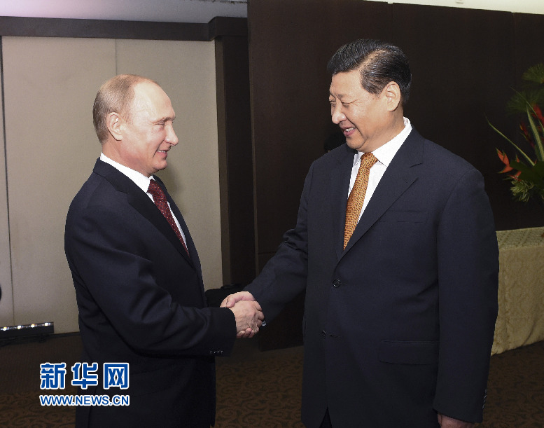 7月14日，國家主席習(xí)近平在巴西福塔萊薩會見俄羅斯總統(tǒng)普京。新華社記者李學(xué)仁攝