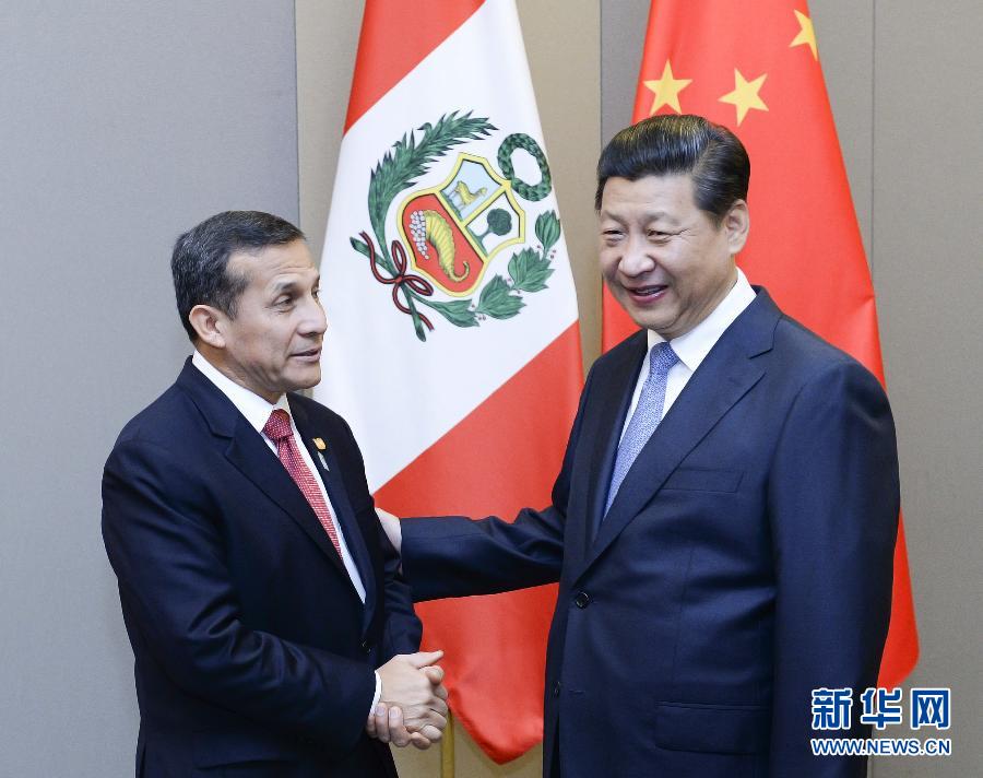 7月16日，國家主席習(xí)近平在巴西首都巴西利亞會見秘魯總統(tǒng)烏馬拉。新華社記者 劉建生 攝 