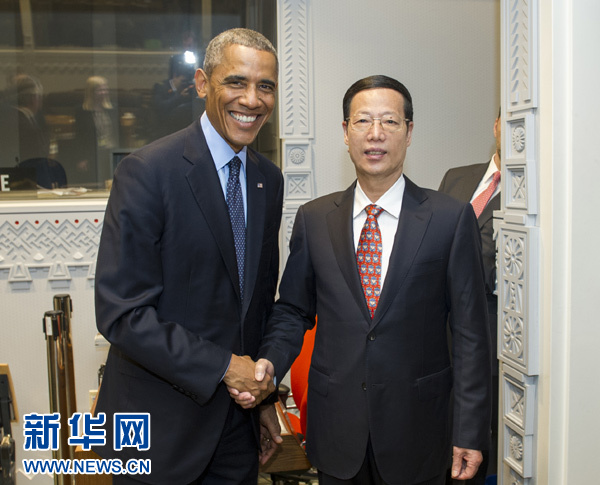 9月23日，國家主席習(xí)近平特使、國務(wù)院副總理張高麗在紐約會見出席聯(lián)合國氣候峰會的美國總統(tǒng)奧巴馬。 新華社記者王曄攝