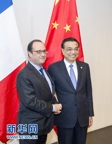 10月16日，中國國務(wù)院總理李克強在米蘭會見法國總統(tǒng)奧朗德。新華社記者 王曄 攝