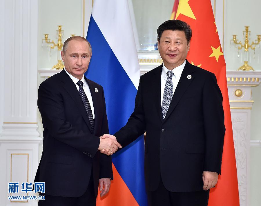 6月23日，國家主席習(xí)近平在烏茲別克斯坦塔什干會(huì)見俄羅斯總統(tǒng)普京。新華社記者李濤攝