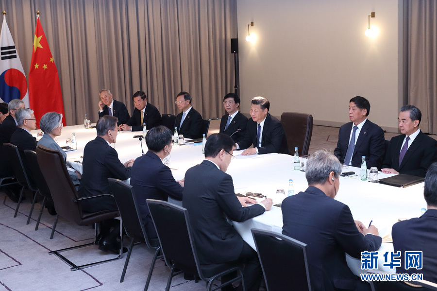 7月6日，國家主席習(xí)近平在柏林會見韓國總統(tǒng)文在寅。 新華社記者 王曄攝
