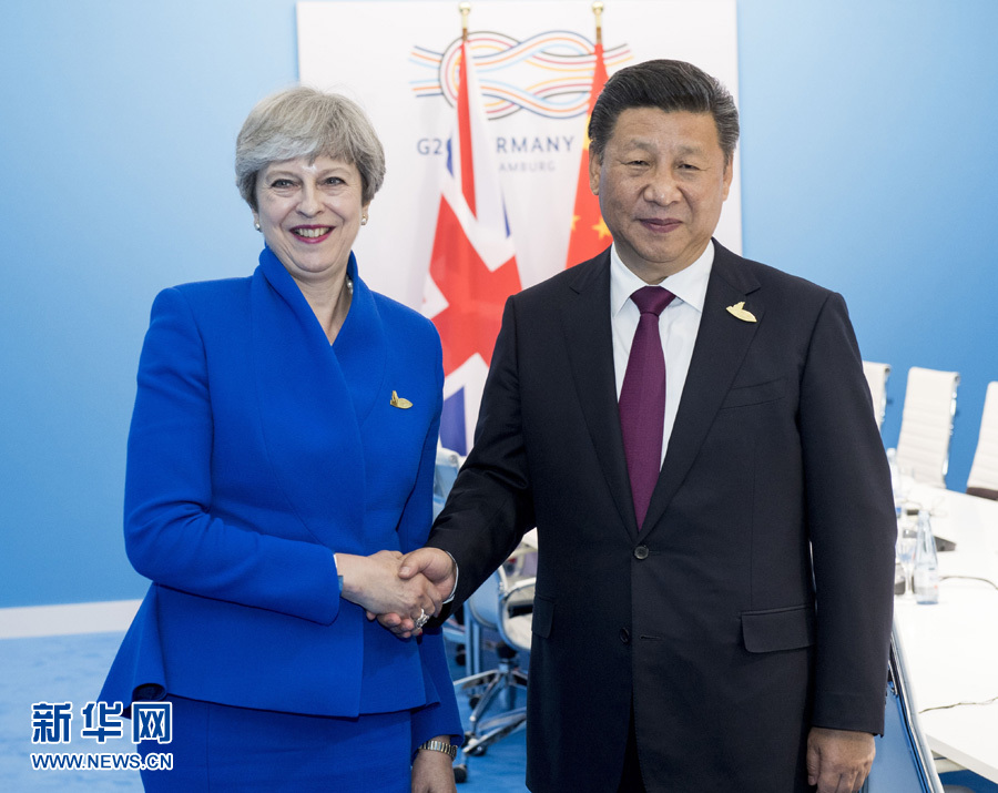 7月7日，國(guó)家主席習(xí)近平在漢堡會(huì)見(jiàn)英國(guó)首相特雷莎·梅。 新華社記者李學(xué)仁 攝